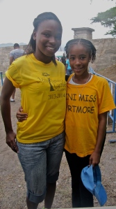 Two charming visitors to the tent: Miss Jamaica/Caribbean Most Talented Teen Josselle Fisher (left) and Miss Mini Portmore Martina Shim. (My photo)