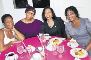More than just tea: (from left) Ruth Chisholm, Dr. Sandra Knight, Althea Williams and Nicole Sewell pose for their photo. (Photo: Lionel Rookwood) 