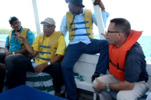 Minister of Agriculture, Labour and Social Security, Hon. Derrick Kellier (2nd left), emphasises a point during conversation with State Minister in the Ministry, Hon. Luther Buchanan (2nd right); Executive Director of the Oracabessa Foundation, Jon Gosse (right); and Executive Director at the Tourism Enhancement Fund (TEF), Clyde Harrison. Occasion was a boat tour of the Oracabessa Fish Sanctuary in St. Mary on May 7. (Photo: Jamaica Information Service)